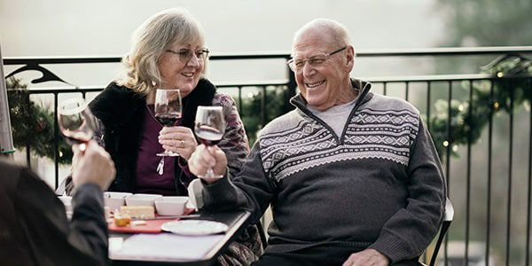 A couple enjoying wine and relaxing