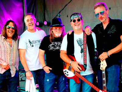 Five male musicians apart of the petty thief band
