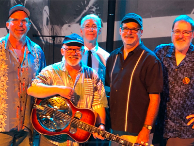 Four male musicians apart of the Kevin Jones Band